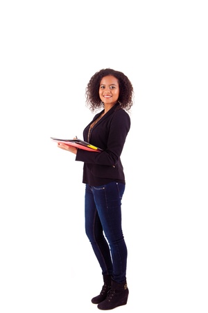 Beautiful african woman scheduling an appointmentの写真素材