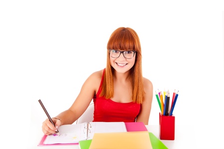 University girl holding a school bag and smilingの写真素材