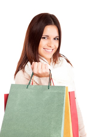 Beautiful woman holding shopping bagsの写真素材