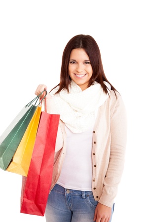 Beautiful woman holding shopping bagsの写真素材
