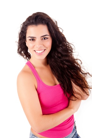 Beautiful woman smiling and posing over white backgroundの写真素材