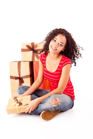 Beautiful african woman with presentsの写真素材