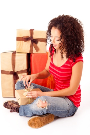 Beautiful african woman with presentsの写真素材