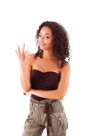 Beautiful african woman showing Ok signの写真素材