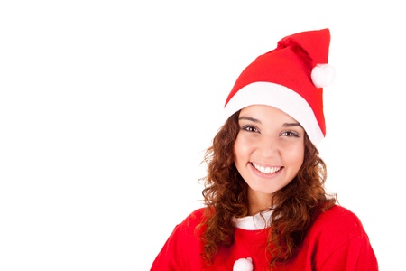 Young woman in red dress and Santa's hat isolated on white backgroundの写真素材