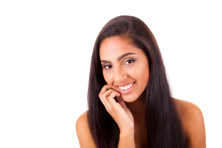 Portrait of a beautiful ethnic woman over white backgroundの写真素材