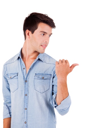 Beautiful man pointing right over white backgroundの写真素材