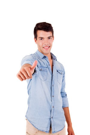 Beautiful man posing doing thumbs up over white backgroundの写真素材