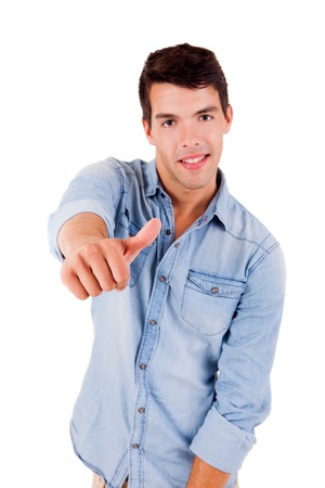 Beautiful man posing doing thumbs up over white backgroundの写真素材