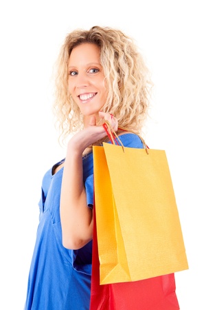 Beautiful blond woman shopping over white backgroundの写真素材