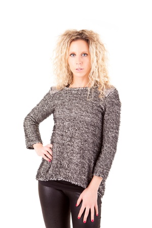 Beautiful blonde woman posing over white backgroundの写真素材