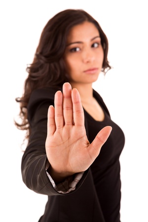businesswoman making stop sign - selective focus on handの写真素材