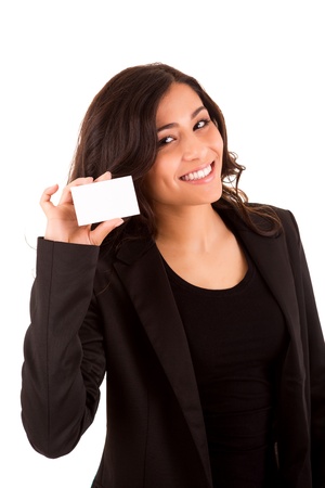 Friendly woman holding a business card and smilingの写真素材