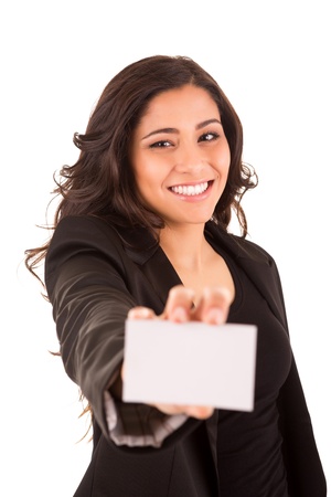Friendly woman holding a business card and smilingの写真素材