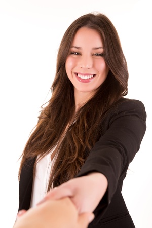 Businesspeople, or businesswoman and client handshakingの写真素材