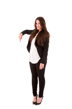 Young beautiful female business executive pointing at copyspaceの写真素材