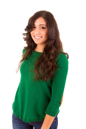 Portrait of a pretty young woman standing against white backgroundの写真素材