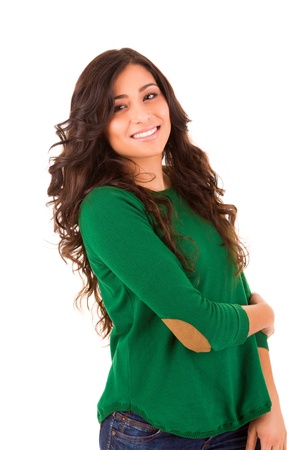 Portrait of a pretty young woman standing against white backgroundの写真素材
