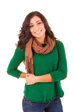 Portrait of a pretty young woman standing against white backgroundの写真素材