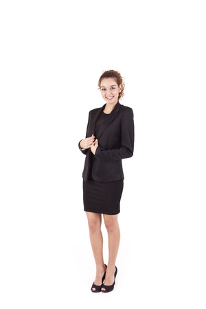 Pretty young business woman smiling on white backgroundの写真素材