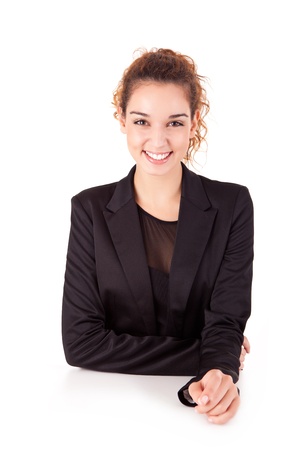 Pretty young business woman smiling on white backgroundの写真素材