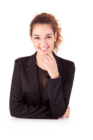 Pretty young business woman smiling on white backgroundの写真素材