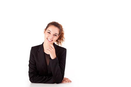 Pretty young business woman smiling on white backgroundの写真素材