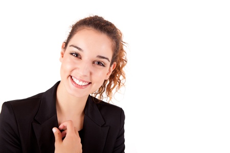 Pretty young business woman smiling on white backgroundの写真素材