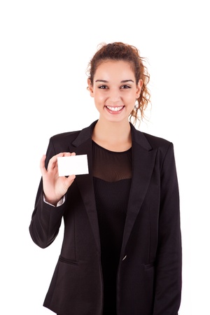 Woman holding empty white card, isolated over whiteの写真素材