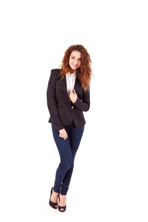 Young beautiful casual business woman posing over white backgroundの写真素材