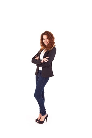 Young beautiful casual business woman posing over white backgroundの写真素材