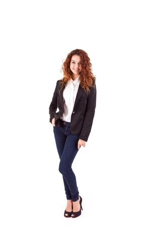 Young beautiful casual business woman posing over white backgroundの写真素材