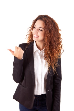  Young beautiful female business executive pointing at copyspaceの写真素材
