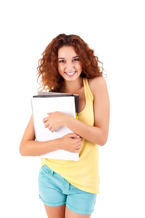 College girl holding books and smilingの写真素材