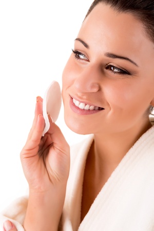 Beautiful woman cleaning her skin - Beauty Care の写真素材