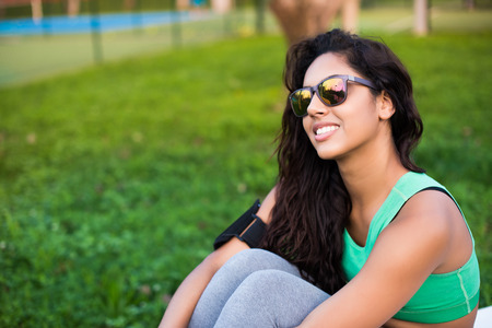 Fitness woman having a break on her exerciseの写真素材