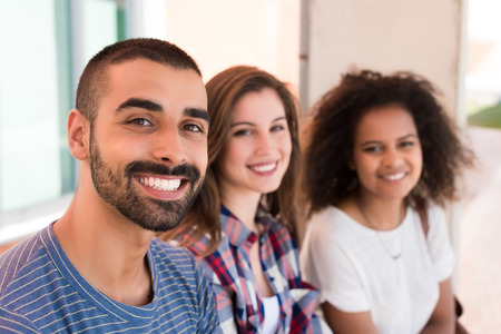 Multi-Ethnic group of students in School Campusの写真素材