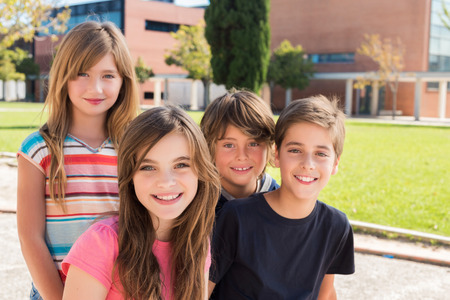 Portrait of group of kids on school campus