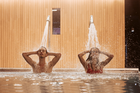 Couple in love at luxury Hotel Spa and poolの写真素材