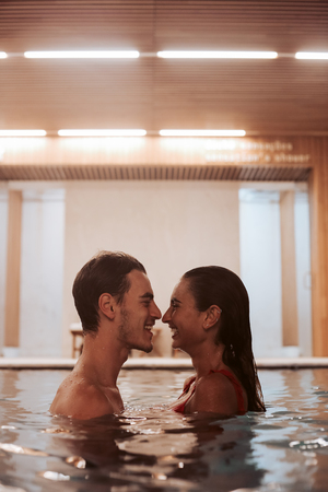 Couple in love at luxury Hotel Spa and poolの写真素材