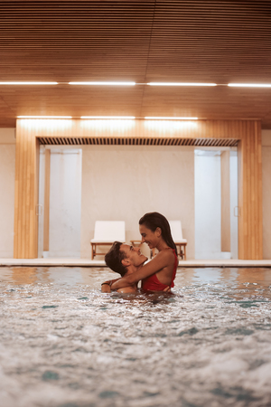 Couple in love at luxury Hotel Spa and poolの写真素材