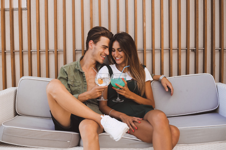 Couple enjoying vacation and drinking cocktails - Spring and Summerの写真素材