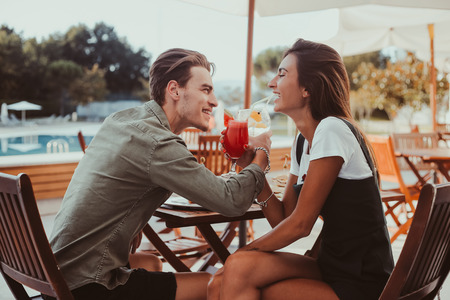 Couple enjoying vacation and drinking cocktails - Spring and Summerの写真素材