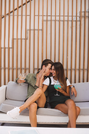 Couple enjoying vacation and drinking cocktails - Spring and Summerの写真素材