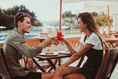 Couple enjoying vacation and drinking cocktails - Spring and Summerの写真素材