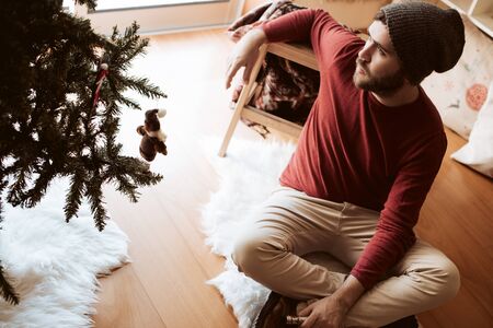 Trendy man using a vaper - Christmas and Winter Seasonの写真素材