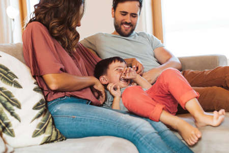 Young family having fun at homeの写真素材