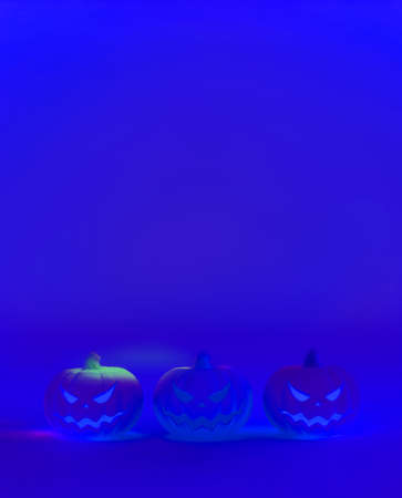 3D rendering painting style illustration three of Jack o lantern the pumpkin with evil face for halloween on fluorescent purple black light with blank space template backgroundの写真素材