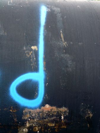 Lowercase letter "d" spray painted on iron の写真素材