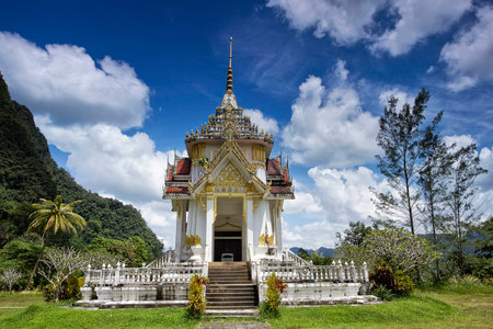 temple at the foot of a mountainの写真素材